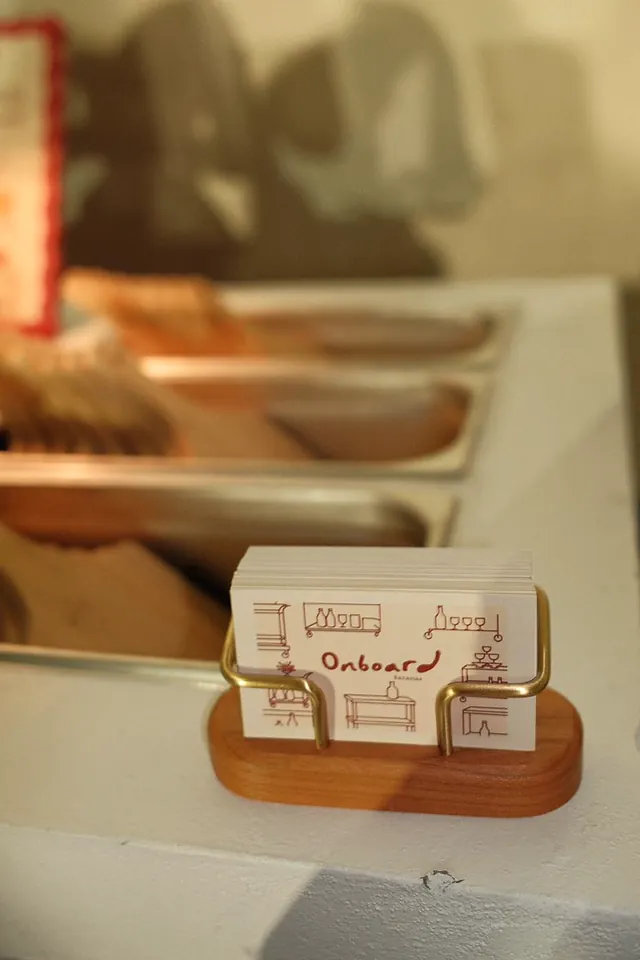 Wooden boards stamped with the Onboard logo
